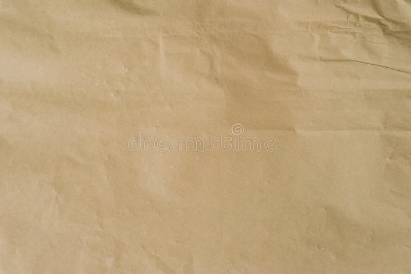 Kraft brown papier i zmięta tło tekstura z przestrzenią zdjęcia stock Kraft brown papier i zmięta tło tekstura z przestrzenią zdjęcia stock