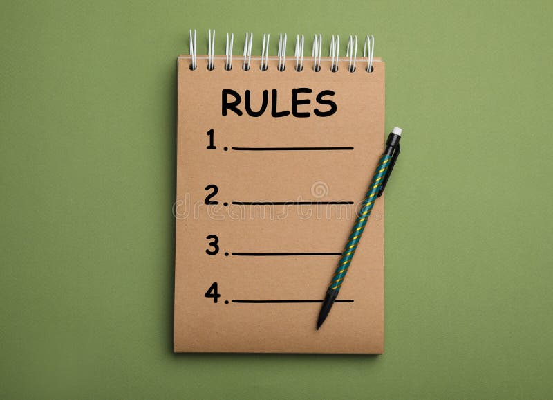 Kraft notebook with list of rules and pencil on background, top view stock image