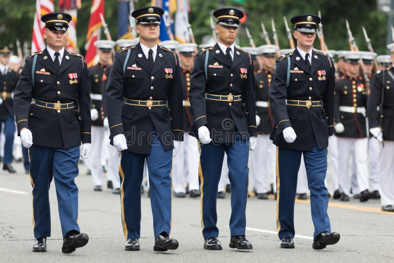 Washington, D.C., USA - May 28, 2018: The National Memorial Day Parade, Members of the United States Army marching down Constitution Avenue. Washington, D.C., USA - May 28, 2018: The National Memorial Day Parade, Members of the United States Army marching down Constitution Avenue