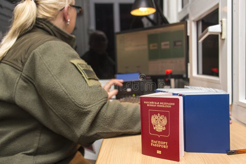 KRAKOVETS, UKRAINE - OCTOBER, 2018: Registration of crossing the state border of Ukraine, verification of documents, passport