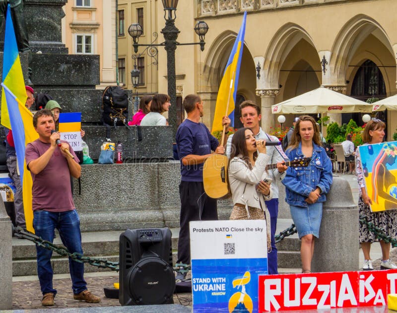 Ukraine-Russia peace demonstration in Krakow. Krakow, Poland - August 12, 2022: `Protest NATO close the sky` for Ukraine in Market Square
