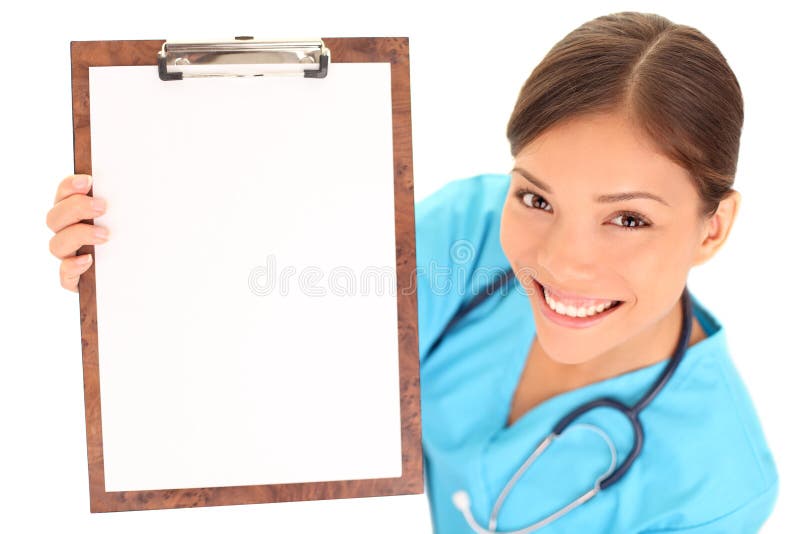 Krankenschwester/Doktor, der unbelegtes Klemmbrettzeichen zeigt lizenzfreie stockfotografie