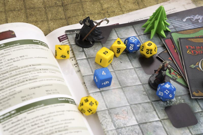 Roleplay game with dragons in dungeon. Yellow field dice Stock Photo by  ©paulzhuk 178871342