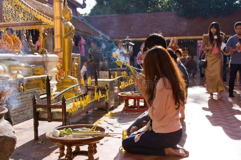 CHIANG MAI, THAILAND - NOVEMBER 11:Thai people are praying for a religious ceremony in the Doi Suthep temple during the Loy Krathong festival in Chiang Mai, Thailand on November 11, 2011. CHIANG MAI, THAILAND - NOVEMBER 11:Thai people are praying for a religious ceremony in the Doi Suthep temple during the Loy Krathong festival in Chiang Mai, Thailand on November 11, 2011