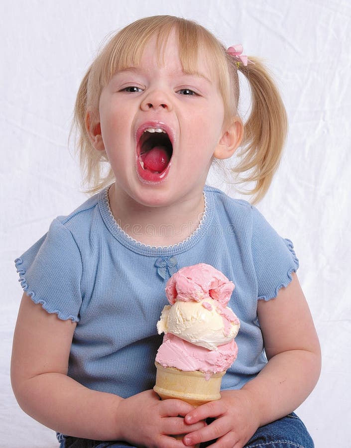 A girl enjoying Ice Cream. A girl enjoying Ice Cream