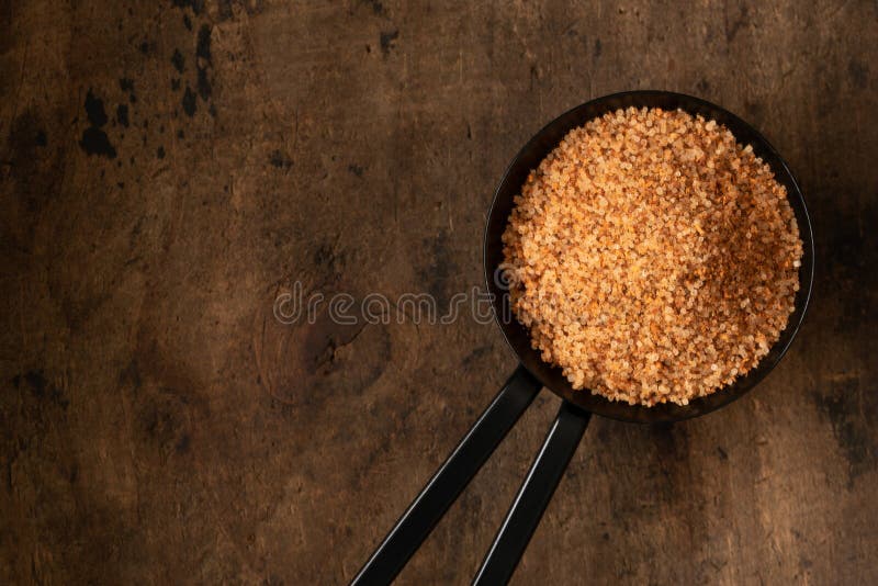 Close up view of creole seasoning on a teaspoon. Close up view of creole seasoning on a teaspoon