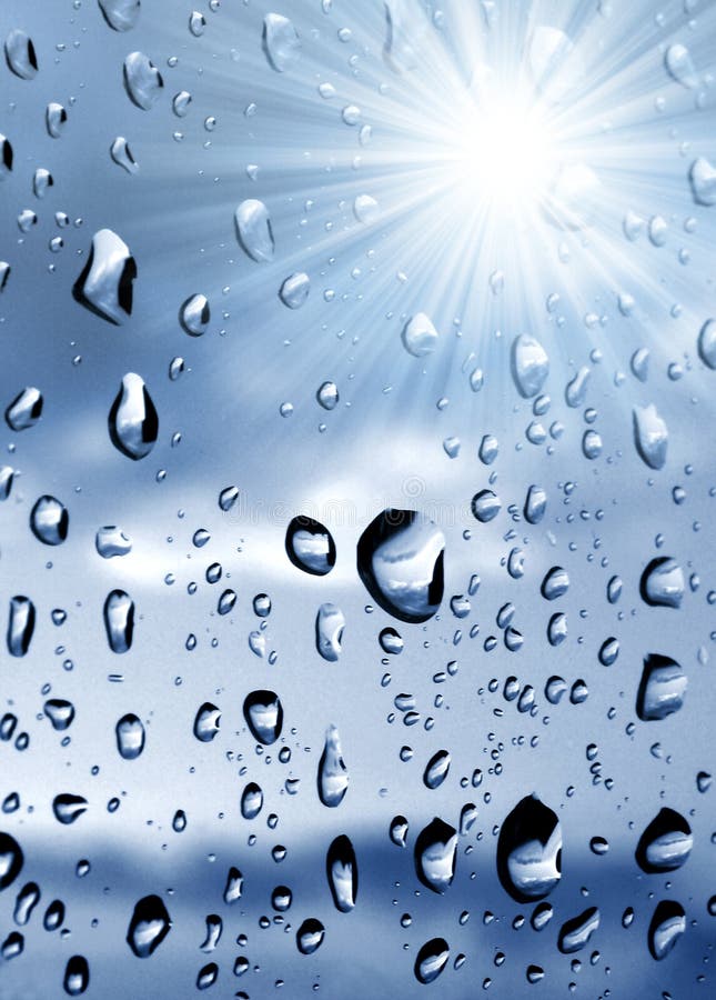 Drops of water on the window with sun rays. Drops of water on the window with sun rays.
