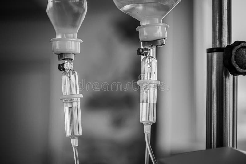 Resuscitation, palliative care, b&w medical concept, Iv bag fluid, 2 intravenous drop saline drip slow, chemotherapy, anaphylactic shock. Resuscitation, palliative care, b&w medical concept, Iv bag fluid, 2 intravenous drop saline drip slow, chemotherapy, anaphylactic shock