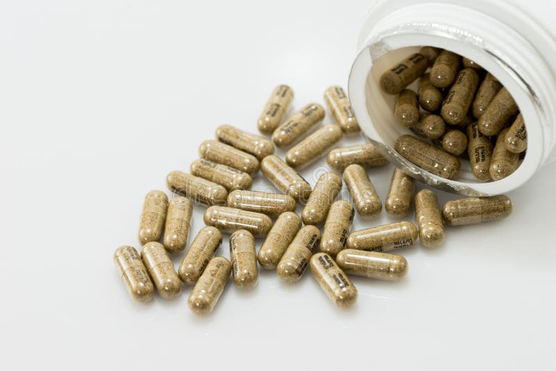 Kruidcapsule het morsen royalty-vrije stock afbeeldingen Kruidcapsule het morsen royalty-vrije stock afbeeldingen