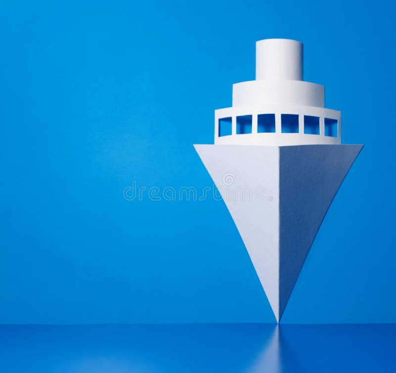 Symbol made of paper with blue background. Symbol made of paper with blue background