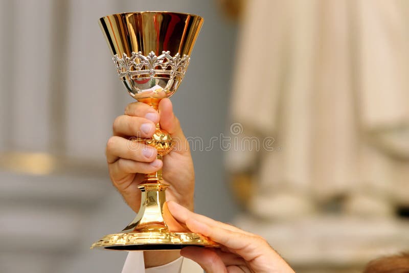 Priest celebrate a mass at the church. Priest celebrate a mass at the church.