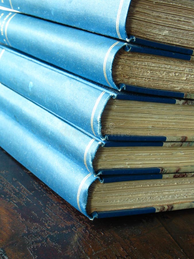 Closeup shot of the end of a stack of books. Closeup shot of the end of a stack of books.