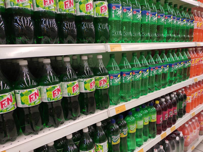 Soft Drinks or Carbonated Drinks Arranged and Stacked on the Rack ...