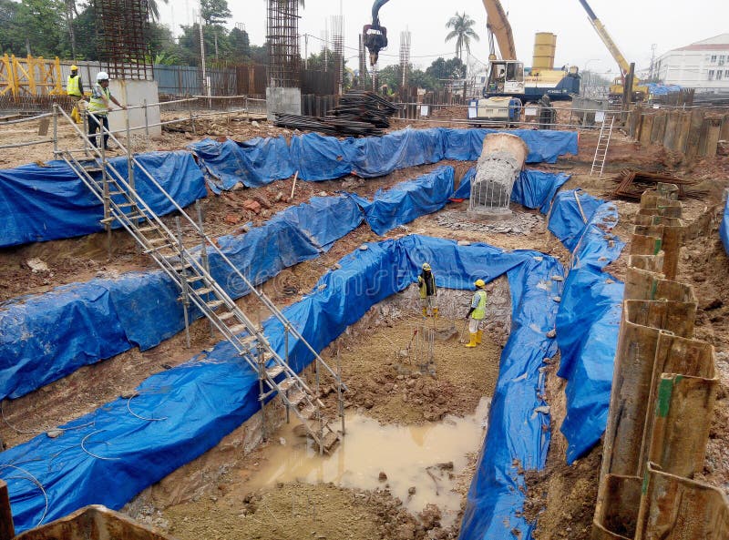 Building Foundation Work at Construction Site. Fabricated by the