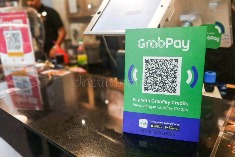 KUALA LUMPUR, MALAYSIA, September 17, 2019: Retail outlet restaurant displaying signage of Grabpay. Online payment via Grabpay is royalty free stock photography KUALA LUMPUR, MALAYSIA, September 17, 2019: Retail outlet restaurant displaying signage of Grabpay. Online payment via Grabpay is royalty free stock photography