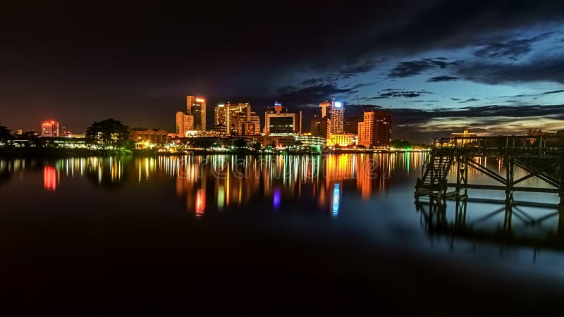 Kuching City at Night with Reflection. Stock Photo - Image of building