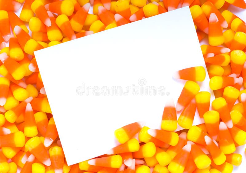 A blank notecard, invitation, or announcement with candy corn. A blank notecard, invitation, or announcement with candy corn