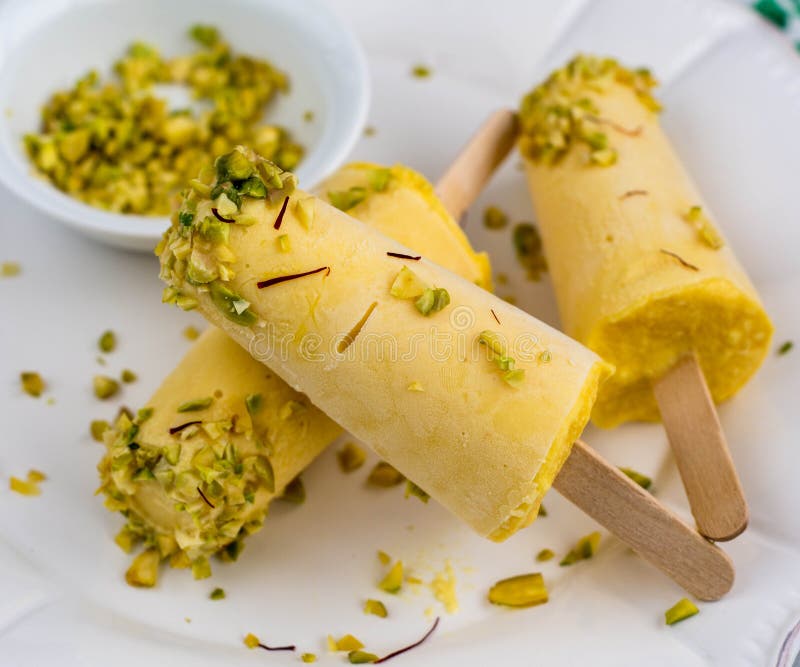 Mango Kulfi - चिलचिलाती गर्मी में ठंडक का मज़ा लें घर की बनी आम की कुल्फी से – जानें आसान रेसिपी 8 408 Kulfi Stock Photos - Free &Amp; Royalty-Free Stock Photos From Dreamstime