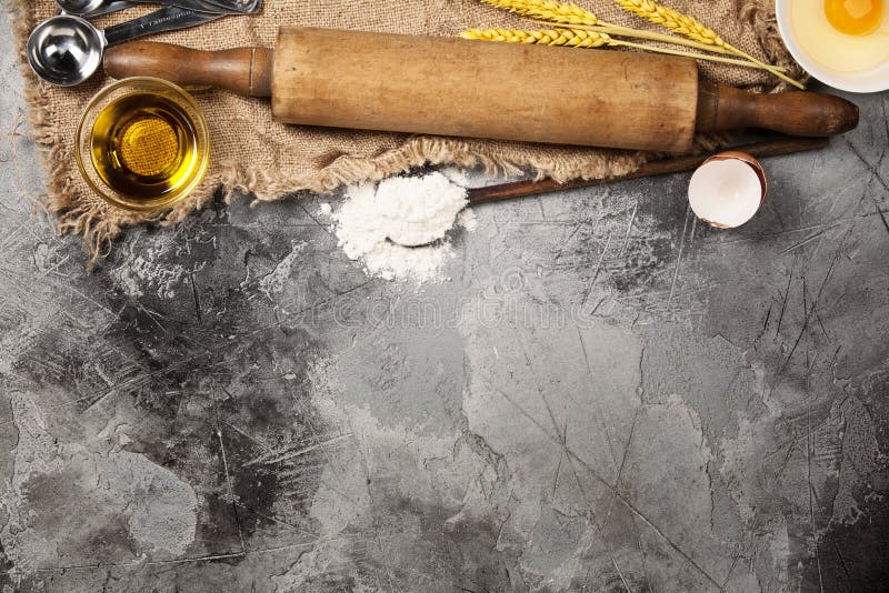 Top view on Old Kitchen cooking utensils on grey stone table - cooking concept. Top view on Old Kitchen cooking utensils on grey stone table - cooking concept