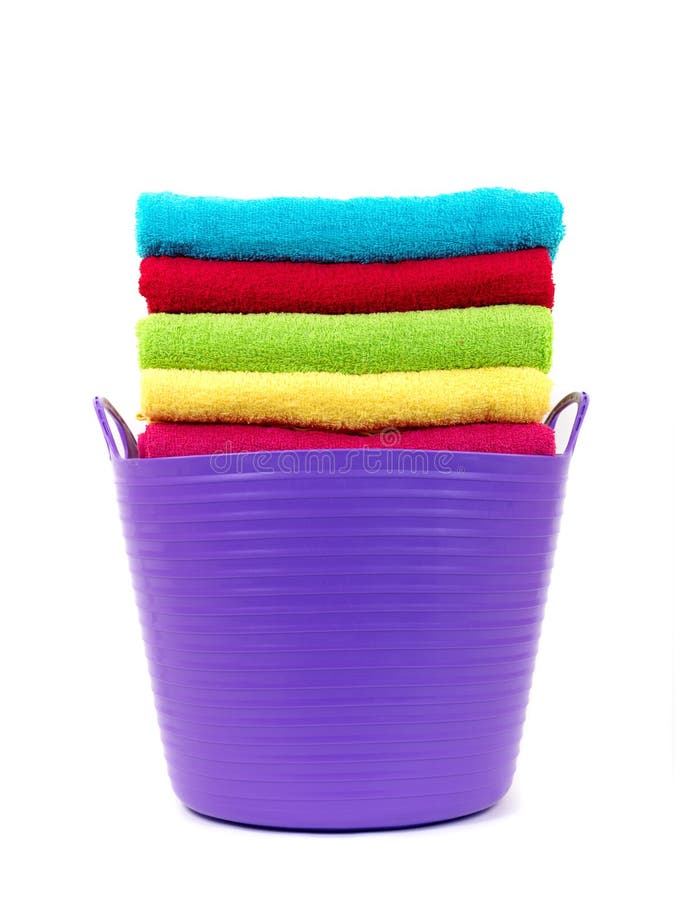 Colored bathroom towels isolated against a white background. Colored bathroom towels isolated against a white background