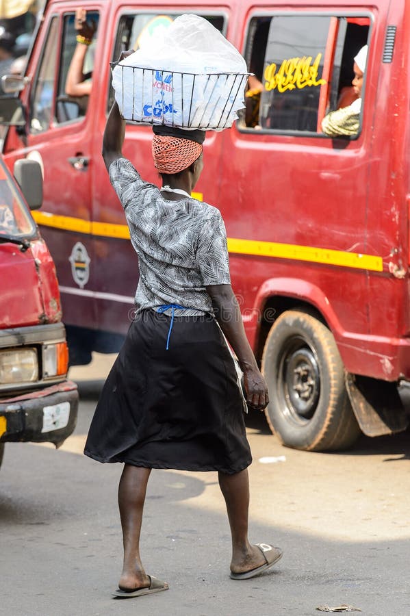 Unidentified Ghanaian Woman Carries A Basket On Her Head At The Editorial Photo Image Of