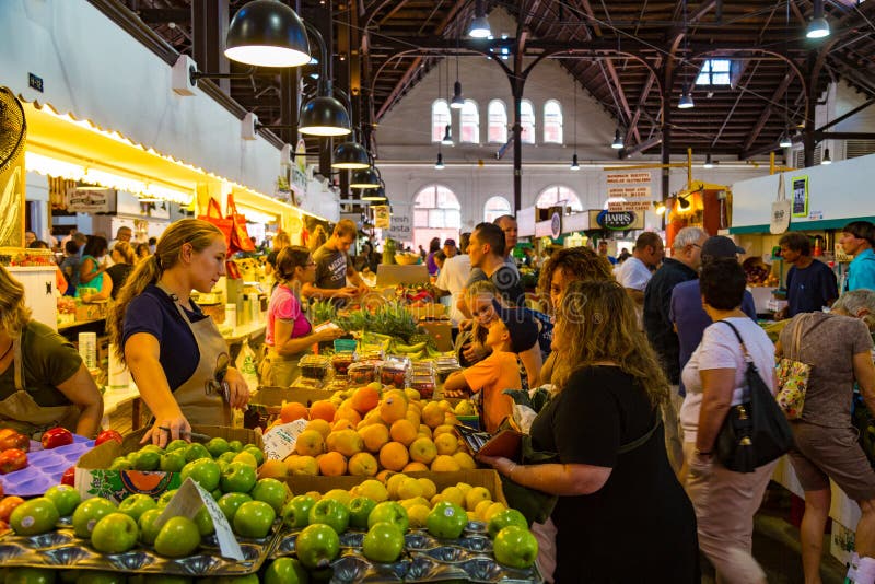 Lancaster, PA - August 20, 2016: Fruits, vegetables, and a variety of other items for sale in the Central Market in the City of Lancaster. Lancaster, PA - August 20, 2016: Fruits, vegetables, and a variety of other items for sale in the Central Market in the City of Lancaster.