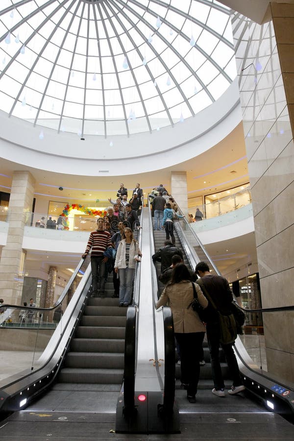 Thursday, October 29, 2009. Customers on the escalators are going for shopping in AFI Palace Cotroceni Mall, in Bucharest, Romania. Thursday, October 29, 2009. Customers on the escalators are going for shopping in AFI Palace Cotroceni Mall, in Bucharest, Romania.