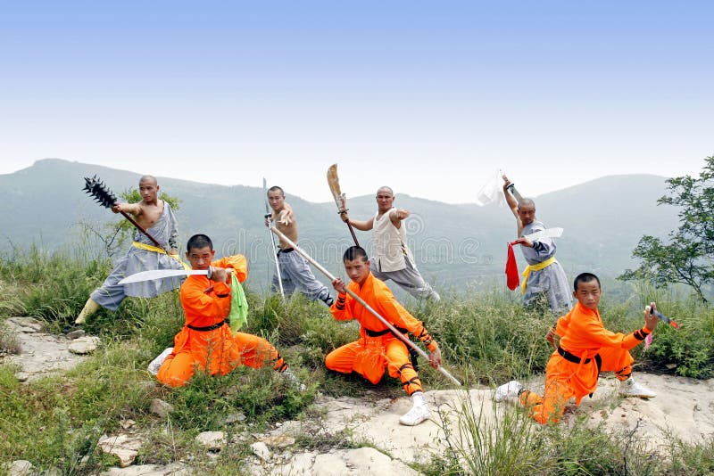 Shaolin monks who performs the Chinese KungFu on the mountain. The true China Shaolin kung fu. Shaolin monks who performs the Chinese KungFu on the mountain. The true China Shaolin kung fu.