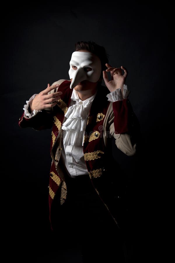 Kunstenaar in een Venetiaans masker royalty-vrije stock fotografie Kunstenaar in een Venetiaans masker royalty-vrije stock fotografie