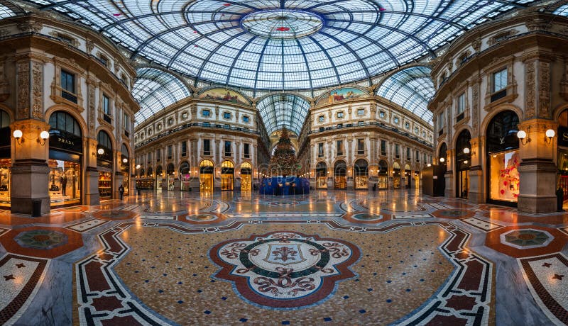 MILAN, ITALY - JANUARY 2, 2015: Galleria Vittorio Emanuele II in Milan. It's one of the world's oldest shopping malls, designed and built by Giuseppe Mengoni between 1865 and 1877. MILAN, ITALY - JANUARY 2, 2015: Galleria Vittorio Emanuele II in Milan. It's one of the world's oldest shopping malls, designed and built by Giuseppe Mengoni between 1865 and 1877.