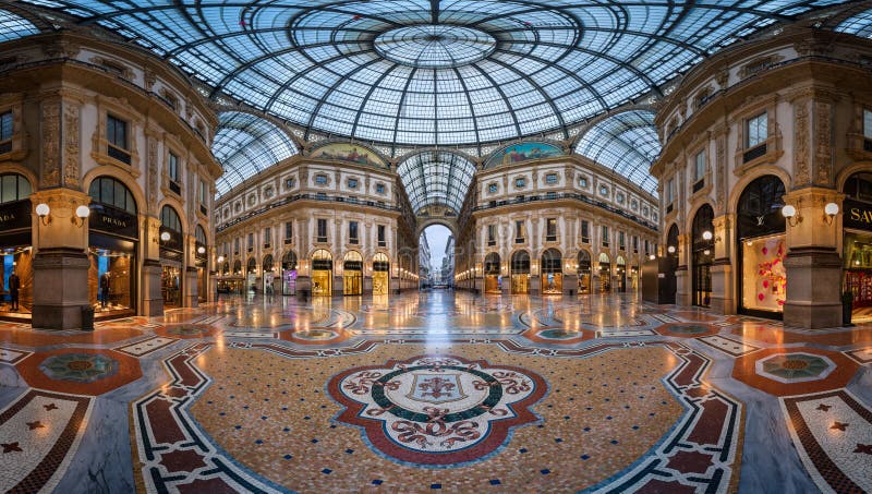 MILAN, ITALY - JANUARY 13, 2015: Galleria Vittorio Emanuele II in Milan. It's one of the world's oldest shopping malls, designed and built by Giuseppe Mengoni between 1865 and 1877. MILAN, ITALY - JANUARY 13, 2015: Galleria Vittorio Emanuele II in Milan. It's one of the world's oldest shopping malls, designed and built by Giuseppe Mengoni between 1865 and 1877.