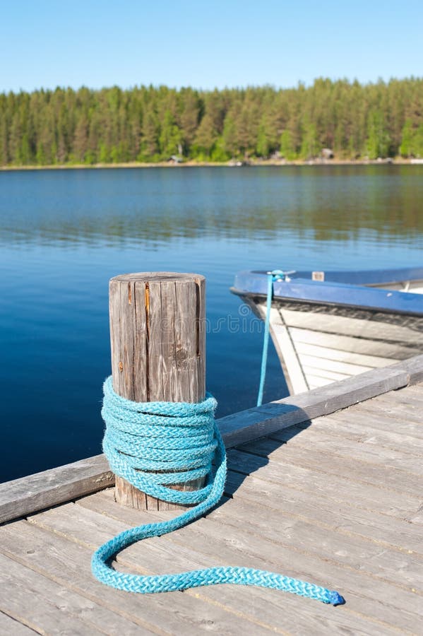 A lake berth - a pole wound with a rope. A lake berth - a pole wound with a rope