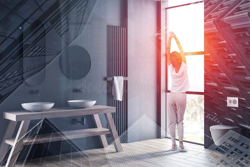Kvinna i grått badrum för dubbel vask