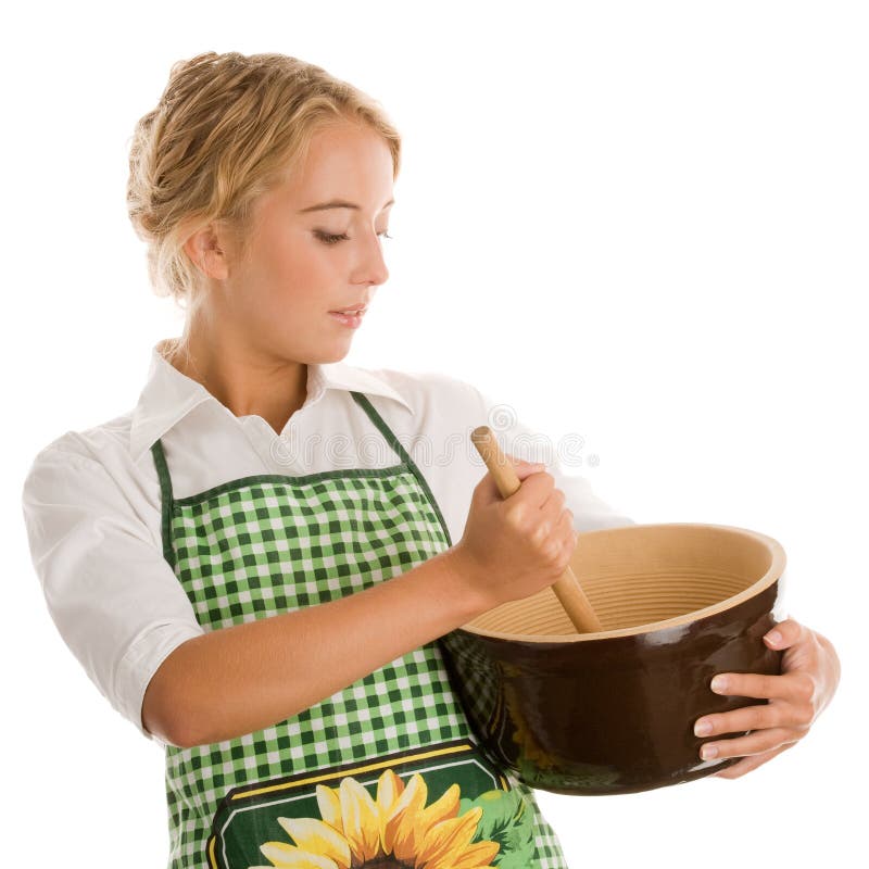 Kvinna som gör caken arkivbild