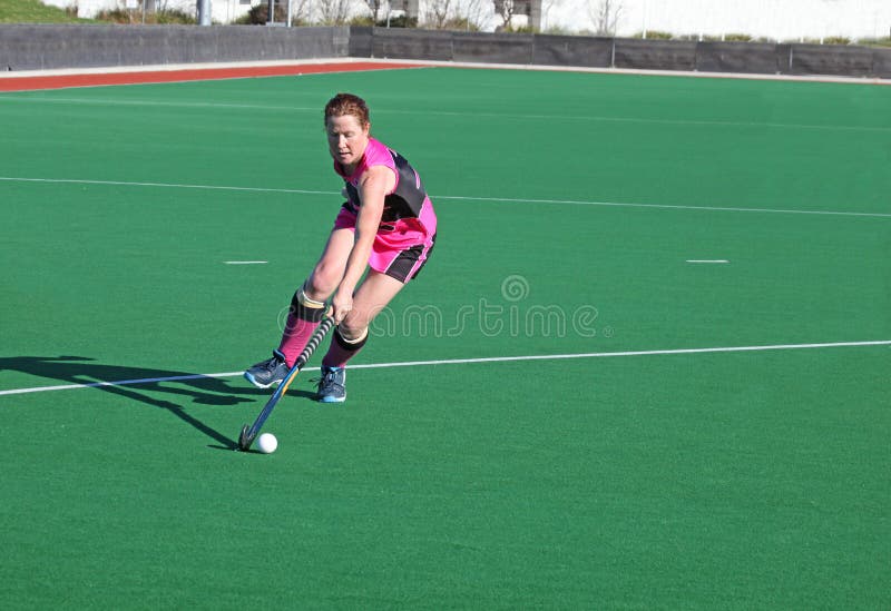 Kvinnahockeyspelare arkivfoto Kvinnahockeyspelare arkivfoto