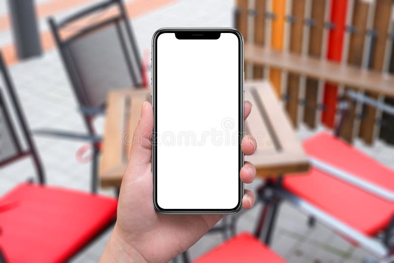 Kvinnan som rymmer den smarta telefonen för modern svart med buktat x, kantar arkivfoton Kvinnan som rymmer den smarta telefonen för modern svart med buktat x, kantar arkivfoton