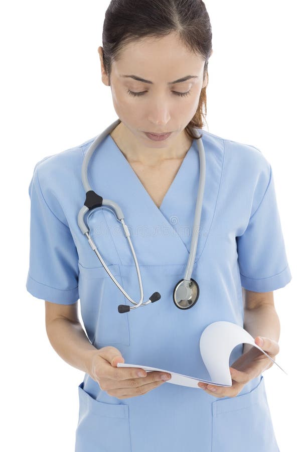 Kvinnliga doktorsläsninganmärkningar royaltyfria bilder Kvinnliga doktorsläsninganmärkningar royaltyfria bilder