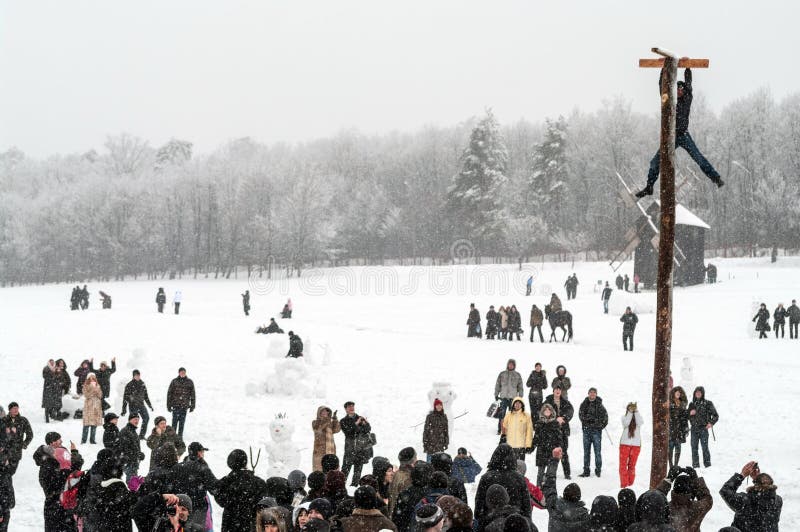 Maslenitsa Shrovetide festivities in around the city. Traditional fun at Shrovetide. Heavy snowfall. royalty free stock image Maslenitsa Shrovetide festivities in around the city. Traditional fun at Shrovetide. Heavy snowfall. royalty free stock image