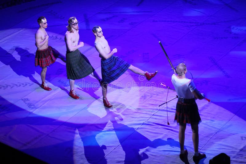 Modern clowns in scottish kilts on circus stage stock images Modern clowns in scottish kilts on circus stage stock images