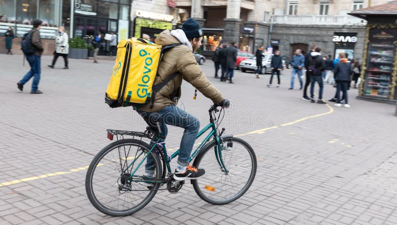 Food Delivery Courier in Kyiv, Ukraine Editorial Image - Image of road