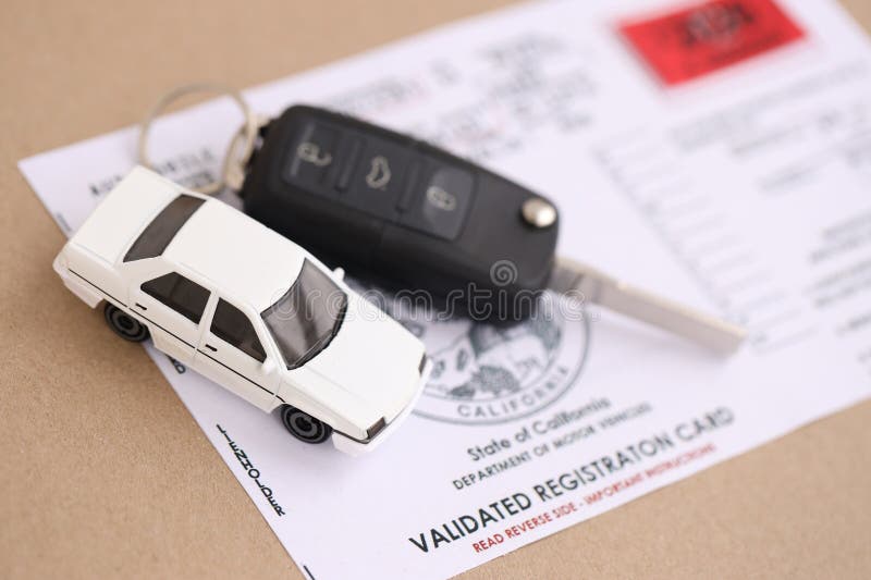 KYIV, UKRAINE - OCTOBER 1, 2025 Validated registration card with remote control car keys royalty free stock images