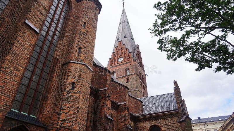 Kyrka van Sanktpetri is een grote kerk in Malmö het in de Gotische stijl wordt gebouwd en een 105 meter de lange toren van 344 v stock fotografie Kyrka van Sanktpetri is een grote kerk in Malmö het in de Gotische stijl wordt gebouwd en een 105 meter de lange toren van 344 v stock fotografie