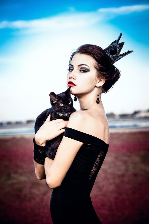 Königin und Katze lizenzfreie stockfotos Königin und Katze lizenzfreie stockfotos