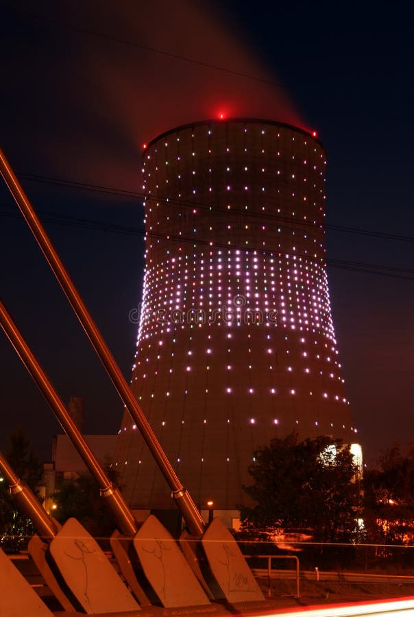 Beautifully lit cooling tower at night. Beautifully lit cooling tower at night