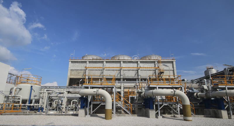 Cooling tower in industrial plant with blue sky. Cooling tower in industrial plant with blue sky