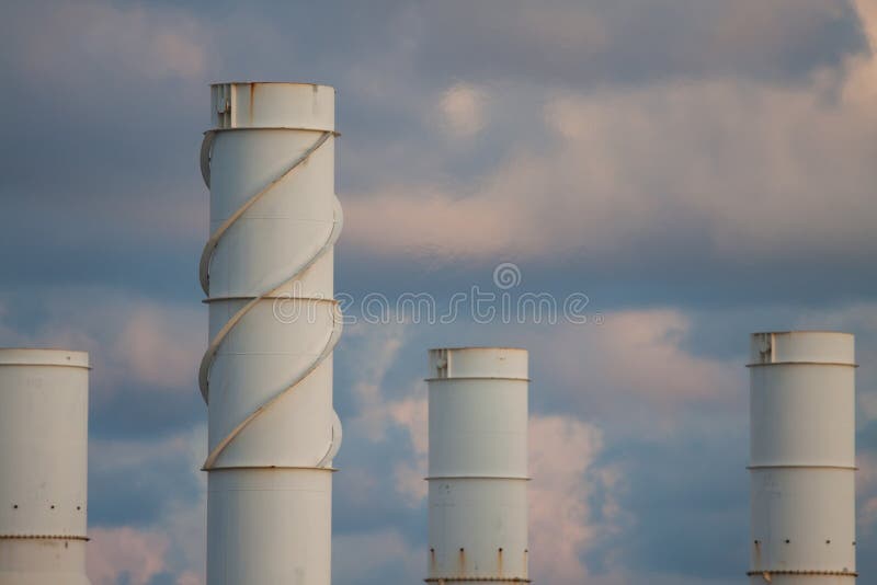 Cooling tower of oil and gas plant, hot gas from the process was cooling as the process, The line as same as the exhaust of turbine system, Do not touch the hot surface and should be follow as Safety rule. Cooling tower of oil and gas plant, hot gas from the process was cooling as the process, The line as same as the exhaust of turbine system, Do not touch the hot surface and should be follow as Safety rule