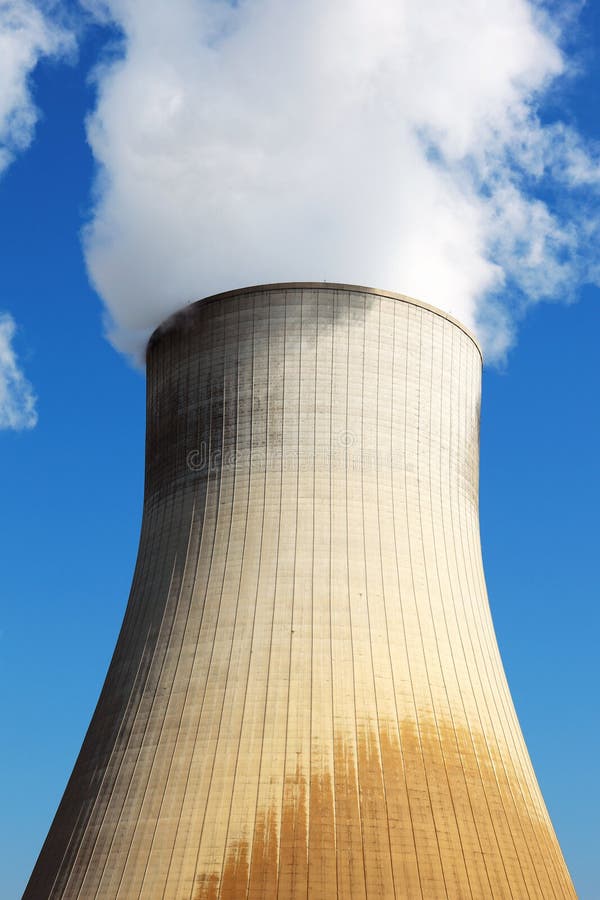 Nuclear power station cooling tower in blue sky. Nuclear power station cooling tower in blue sky