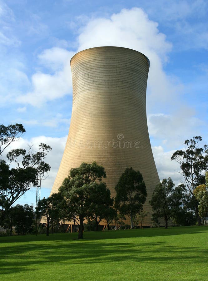 nuclear plant cooling tower with steam rising from top, beautiful sunny day. nuclear plant cooling tower with steam rising from top, beautiful sunny day