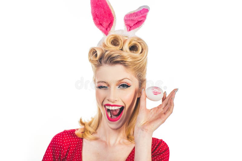 Küssen Sie und blinzeln Sie Ostern-Karten Hand mit Farbe-Ostereiern Süßes entzückendes Mädchen in den Häschenohren Ostern feiernd lizenzfreie stockbilder Küssen Sie und blinzeln Sie Ostern-Karten Hand mit Farbe-Ostereiern Süßes entzückendes Mädchen in den Häschenohren Ostern feiernd lizenzfreie stockbilder