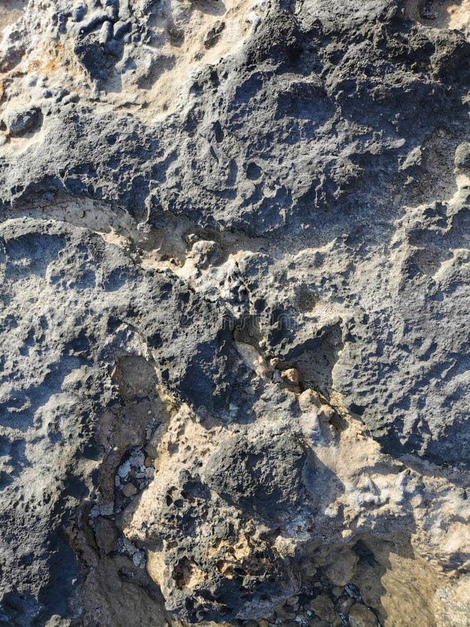 Küste des Mittelmeers lang gefrorene Lava. Hintergrund. Es sieht aus wie eine außerirdische Landschaft stockbilder